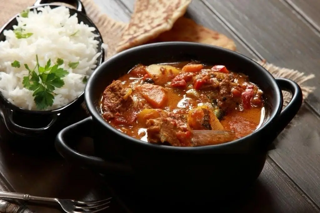 Puerto Rican beef stew with tender beef chunks and vegetables served in a bowl